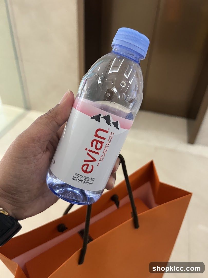 Evian Water Bottle with Shopping Bag