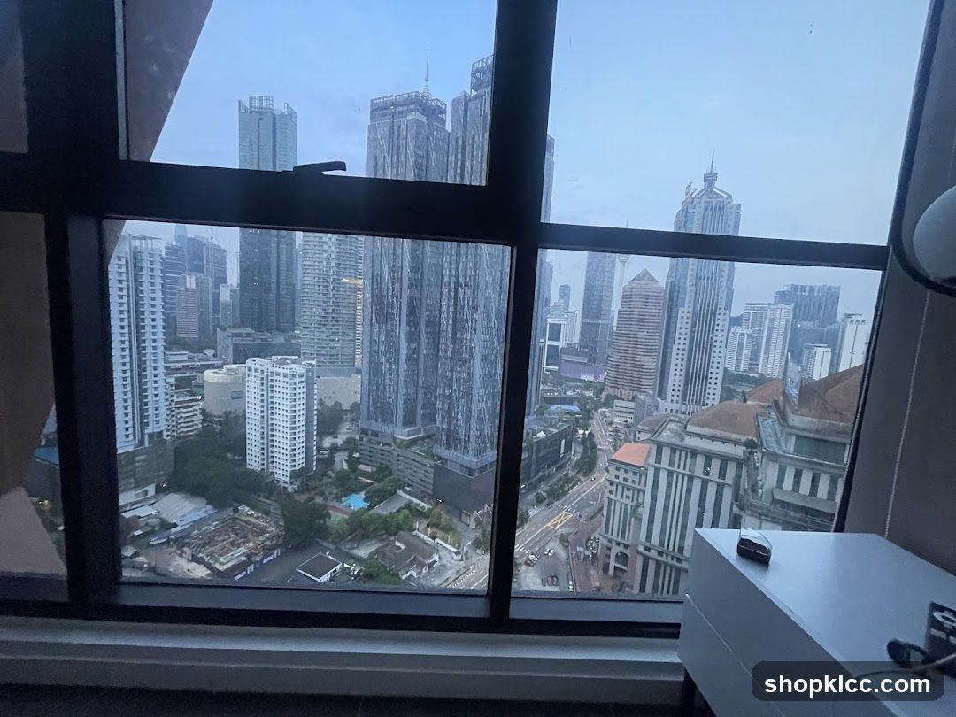 Cityscape View from High-Rise Window