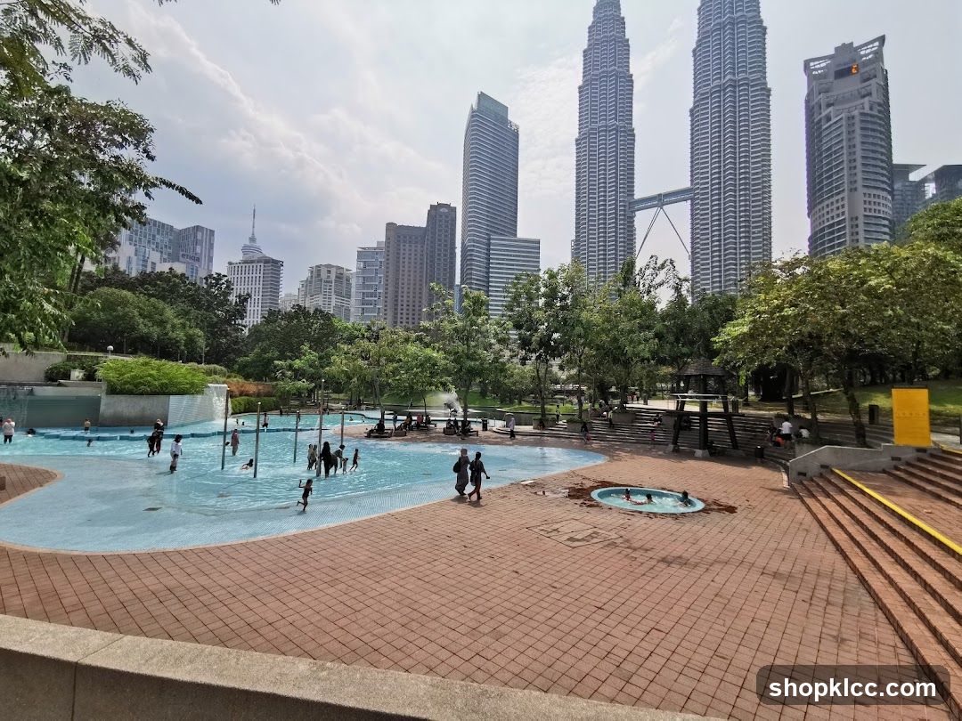 Park with splash pad and city skyline