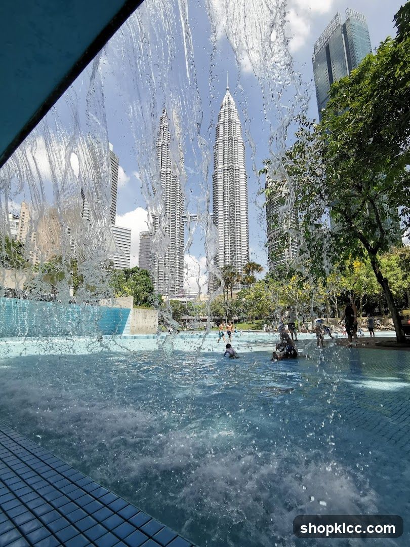 People swimming in a pool with skyscrapers in the background