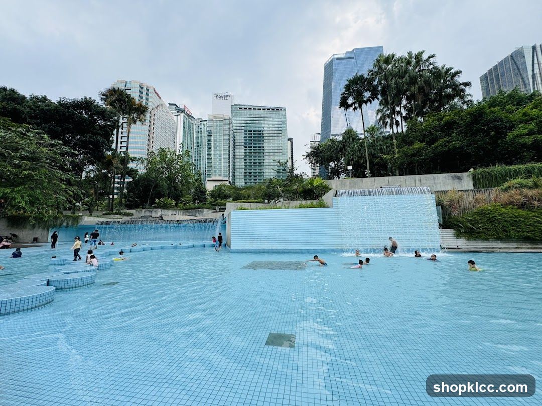 People swimming in a pool with city skyscrapers in the background