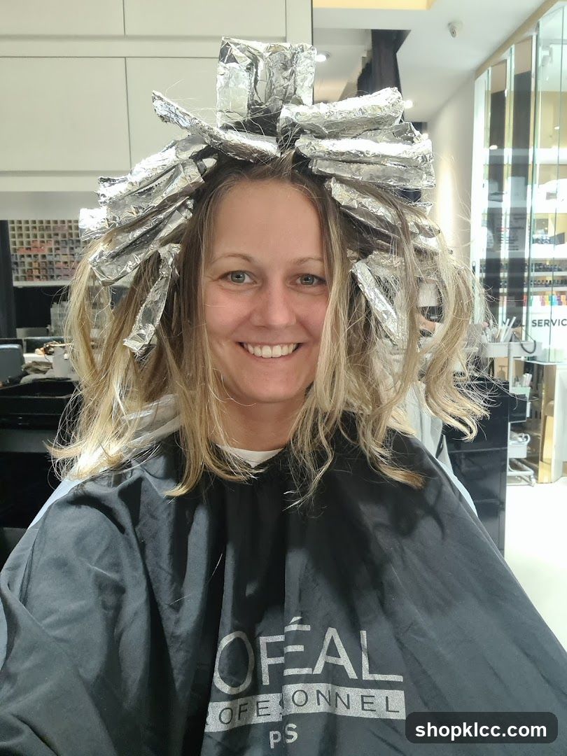 Woman with hair in foils