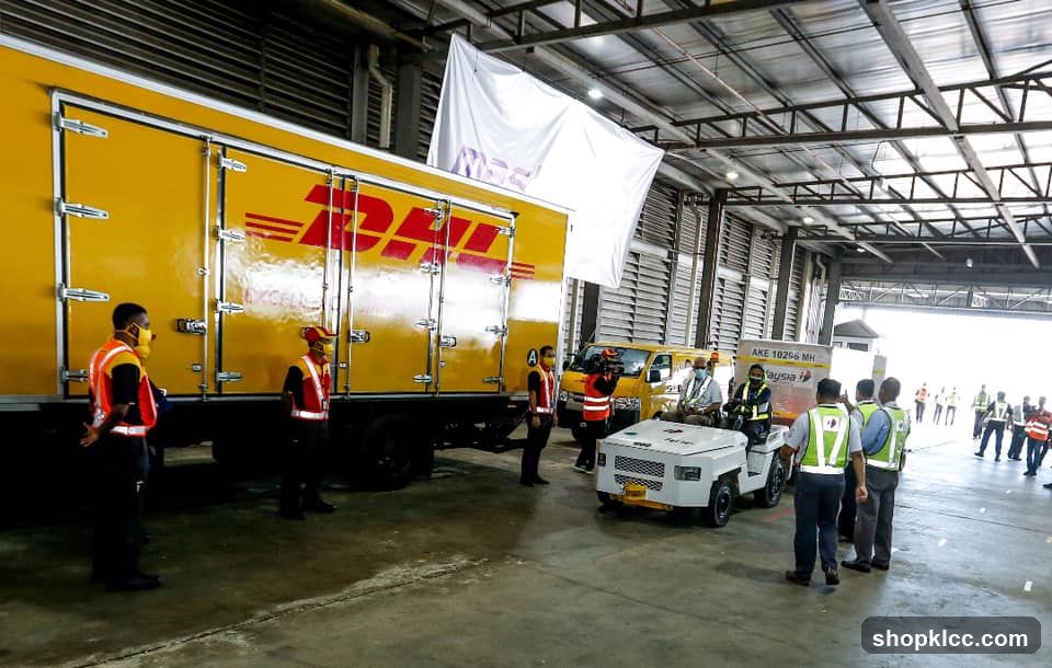 DHL Truck and Personnel