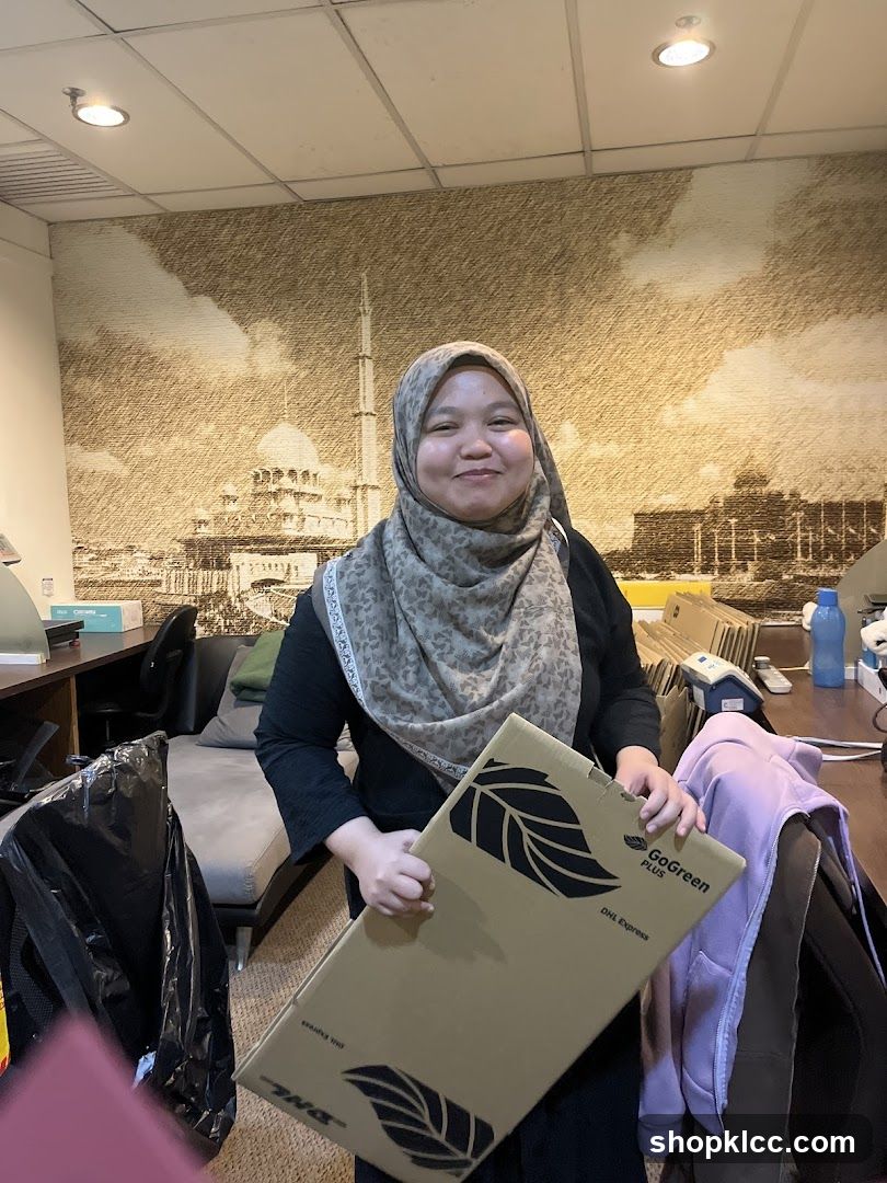 Woman holding a DHL Express package