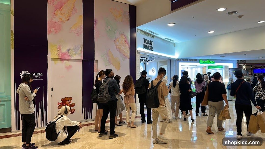 Mall interior with people queuing