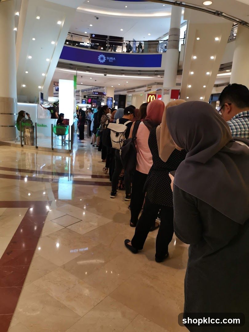 People queuing in a mall