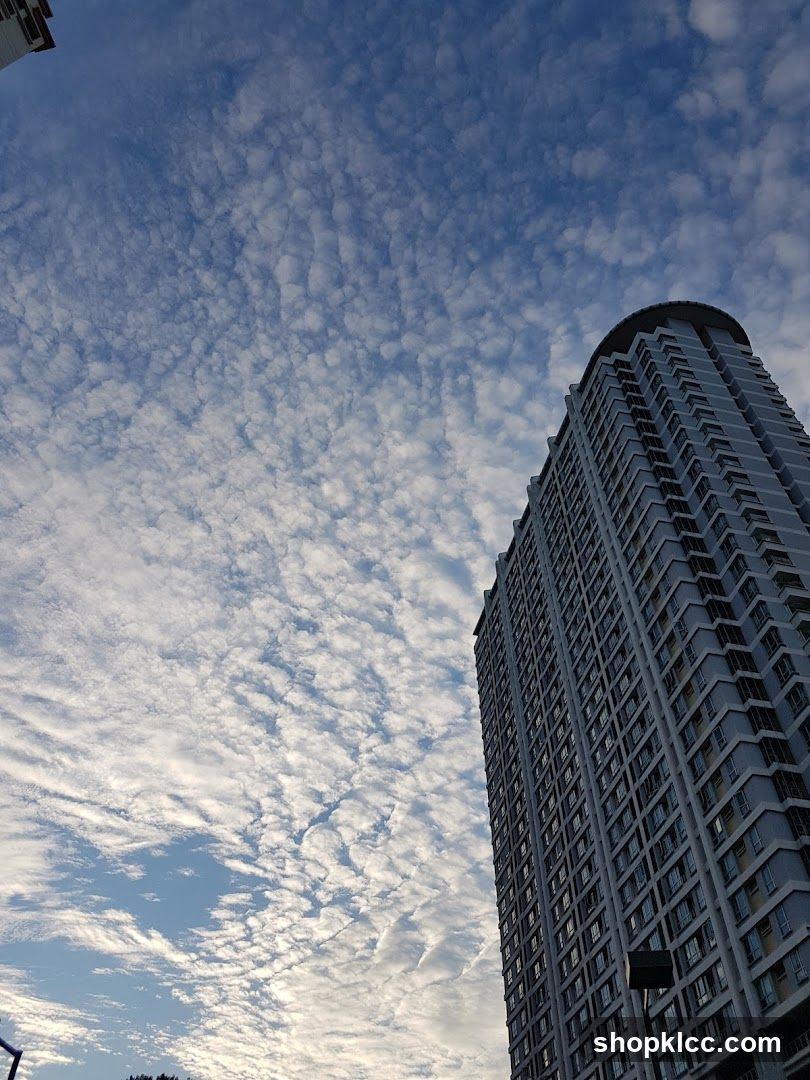 Tall Building Under Cloudy Sky