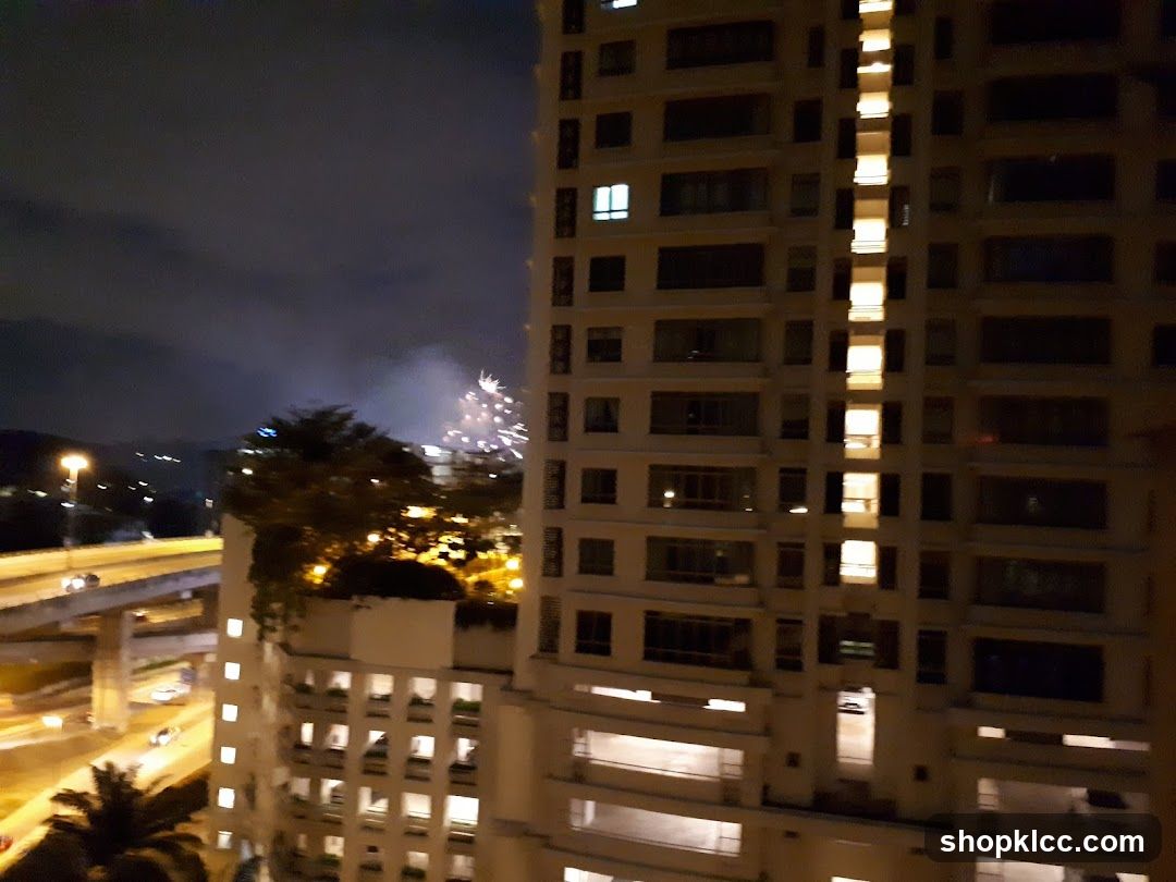 Fireworks display over a city at night