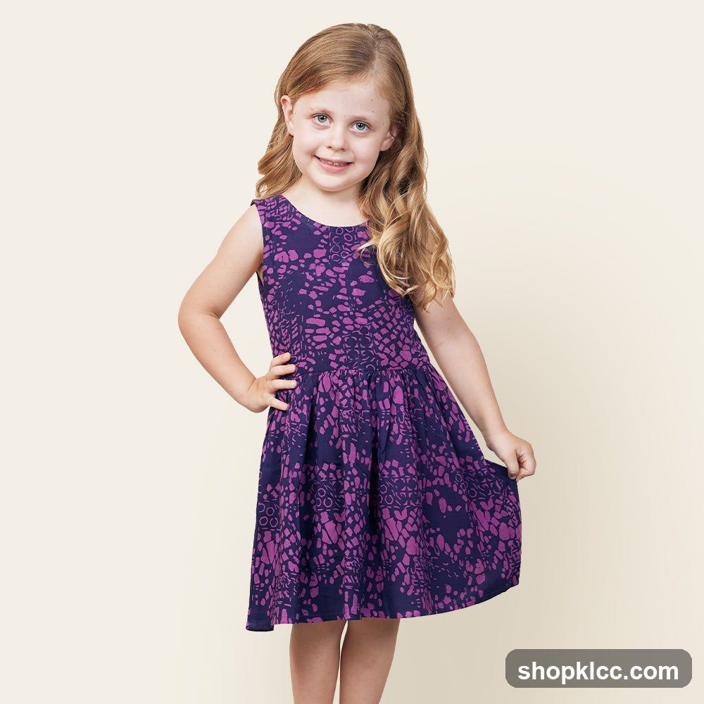 Girl in a purple dress