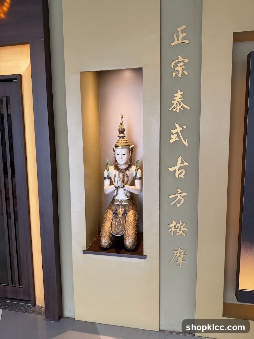 Thai Massage Statue and Sign