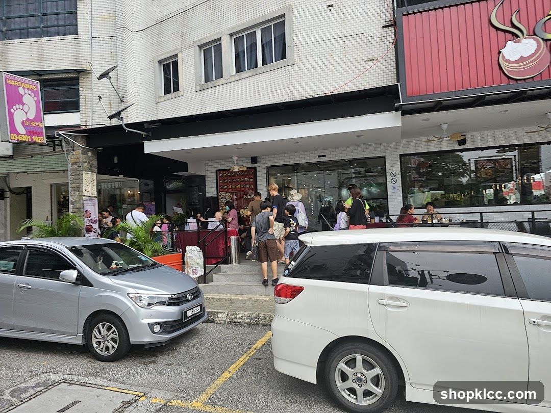 Street view of a restaurant with outdoor seating