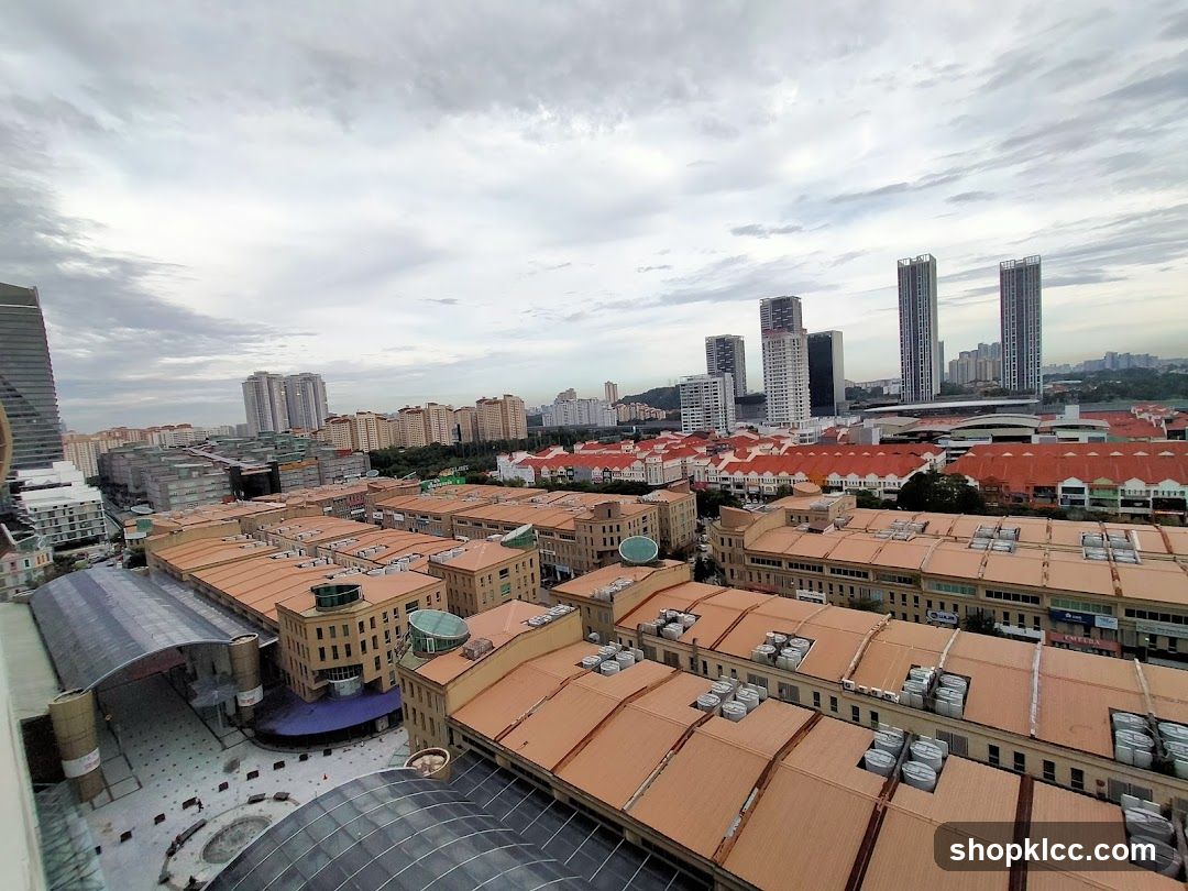 Cityscape with red-tiled roofs and high-rise buildings