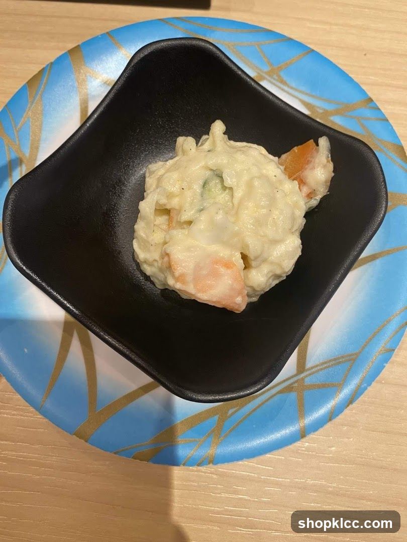 Creamy Salad in Black Bowl