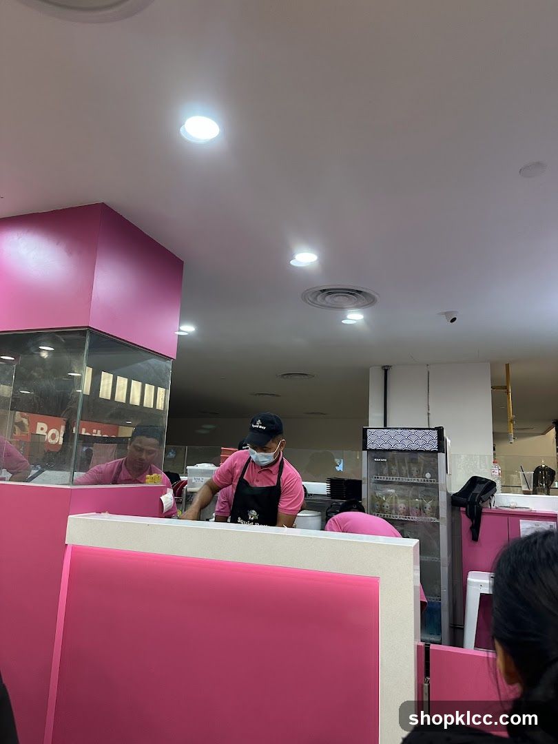 Pink-themed food service counter