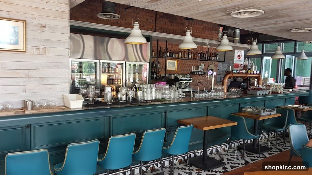 Bar Interior with Blue Chairs and Wooden Tables