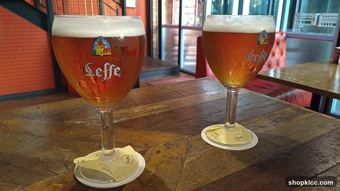 Leffe Beer Glasses on Wooden Table