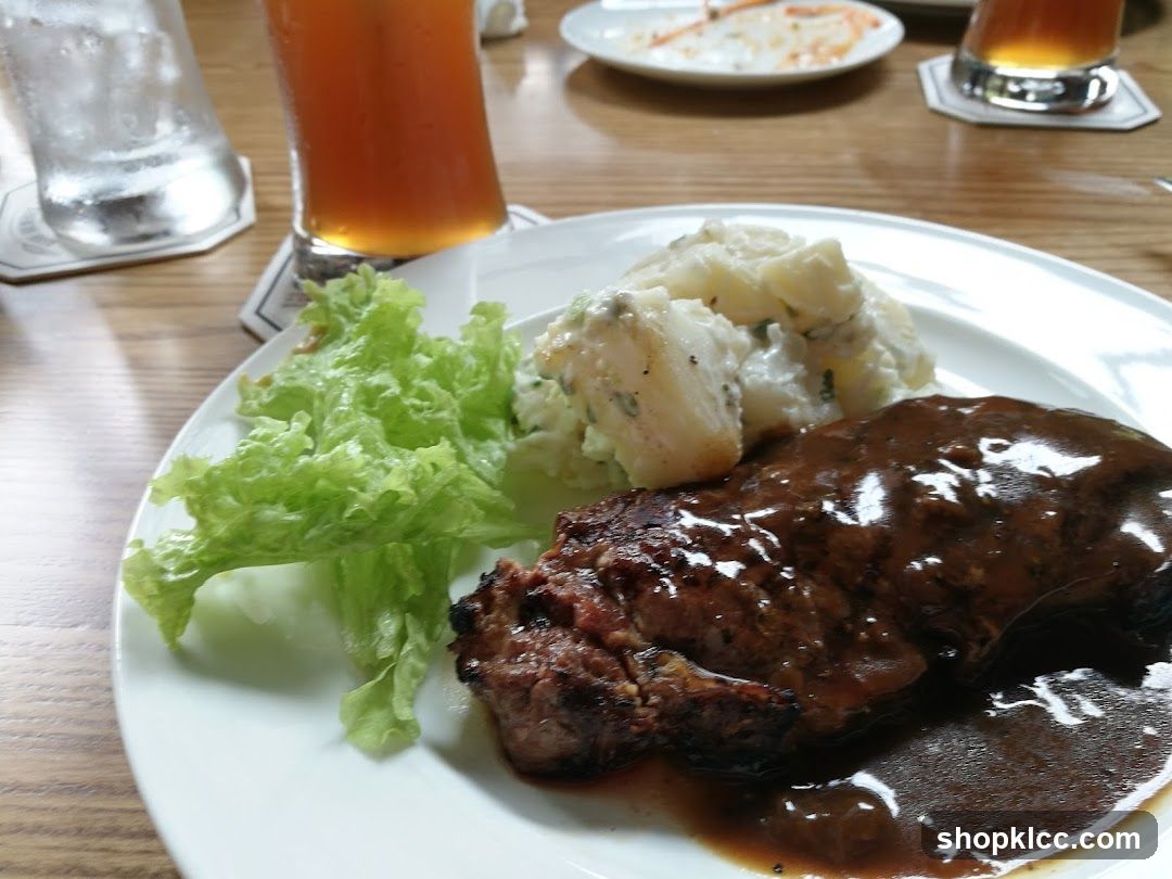 Steak with Mashed Potatoes and Lettuce