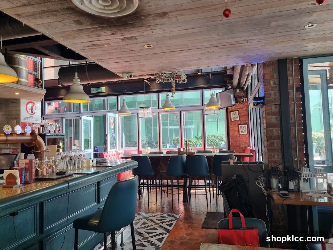 Interior of a bar or restaurant with exposed brick and wooden ceiling