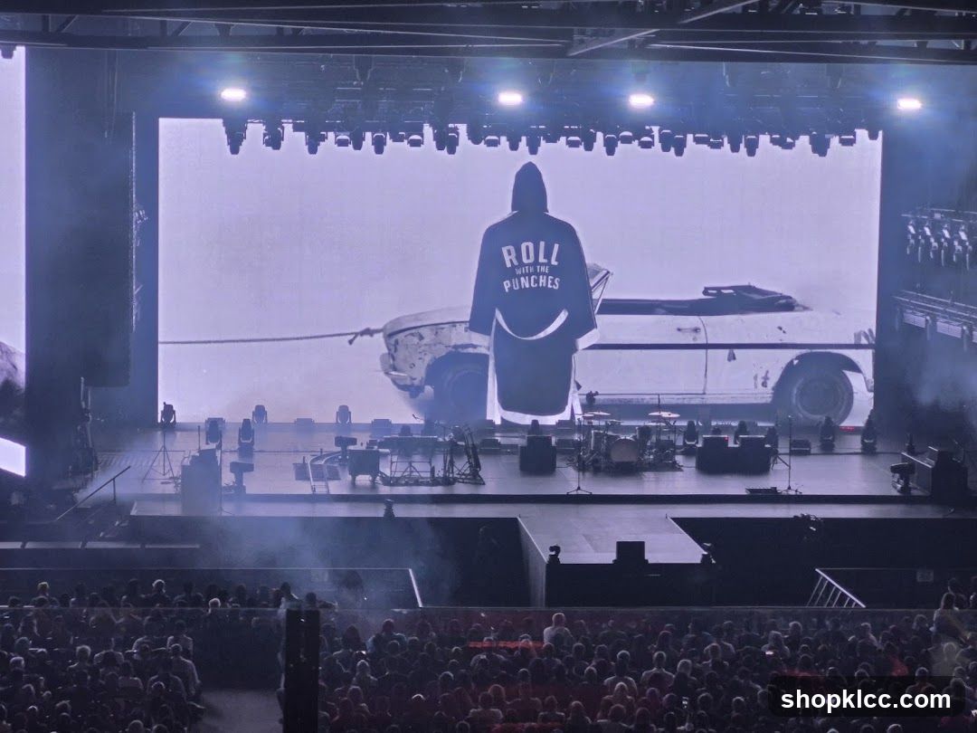 Concert Stage with Hooded Figure and Car