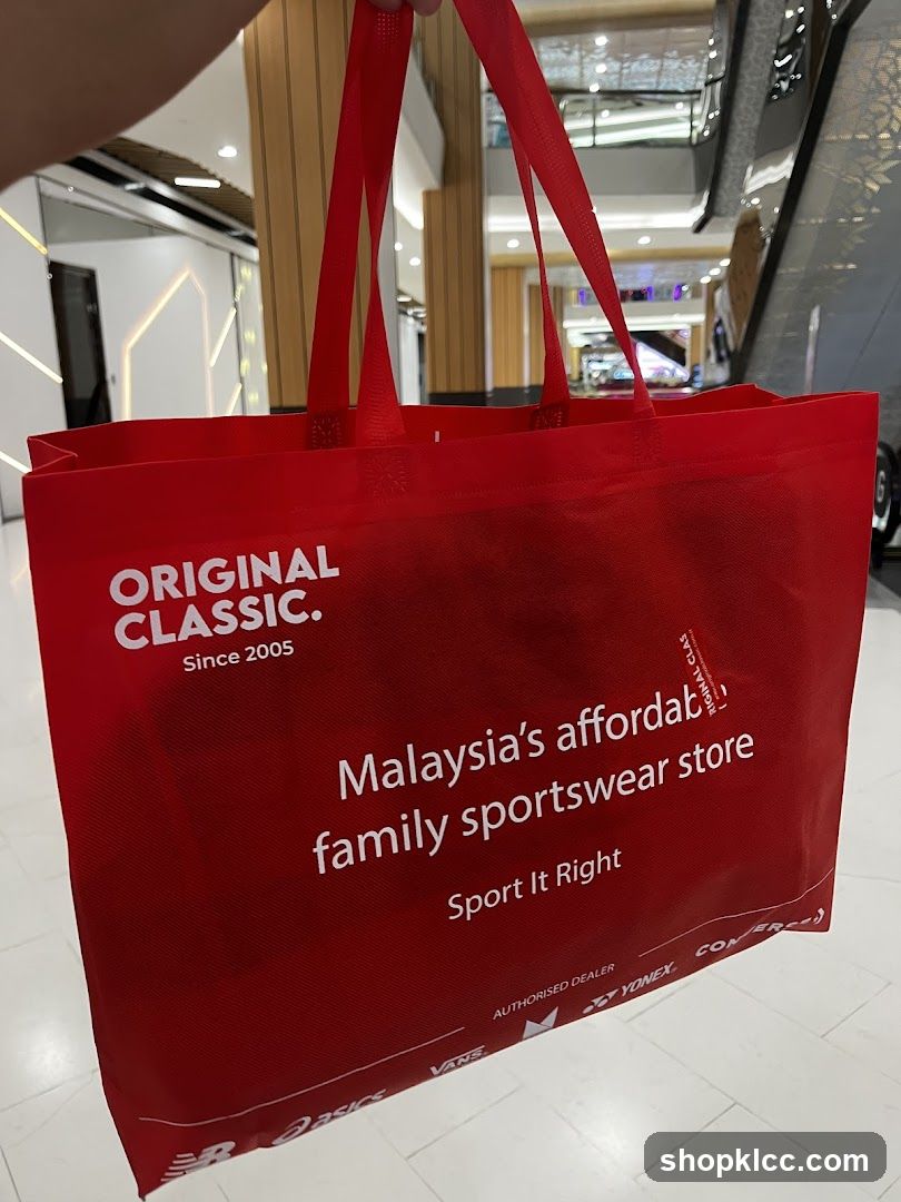 Red Shopping Bag with Sportswear Store Text