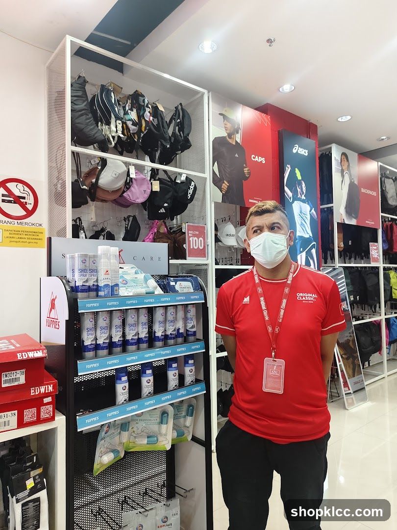 Asics Store Interior with Staff Member