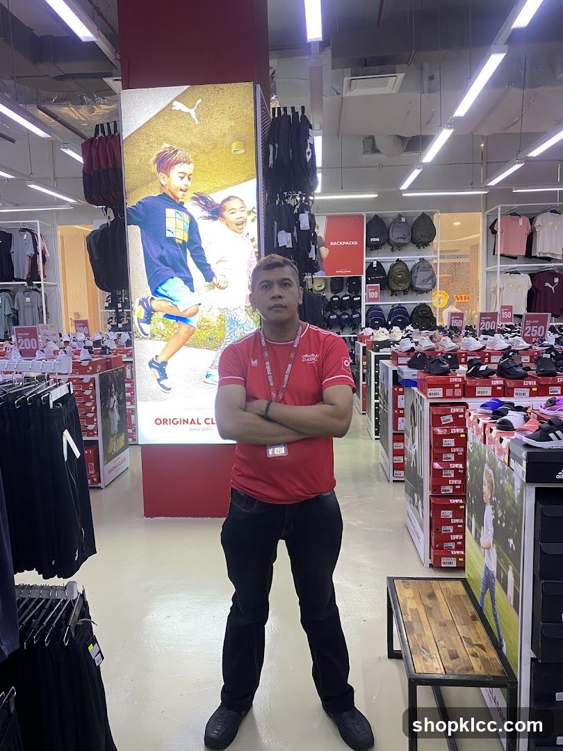 Sports Store Interior with Staff
