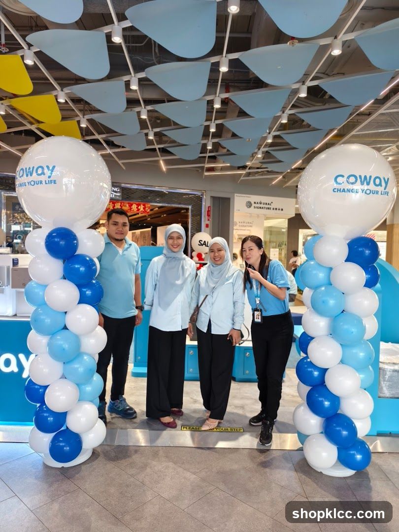 Coway Staff Posing with Balloons