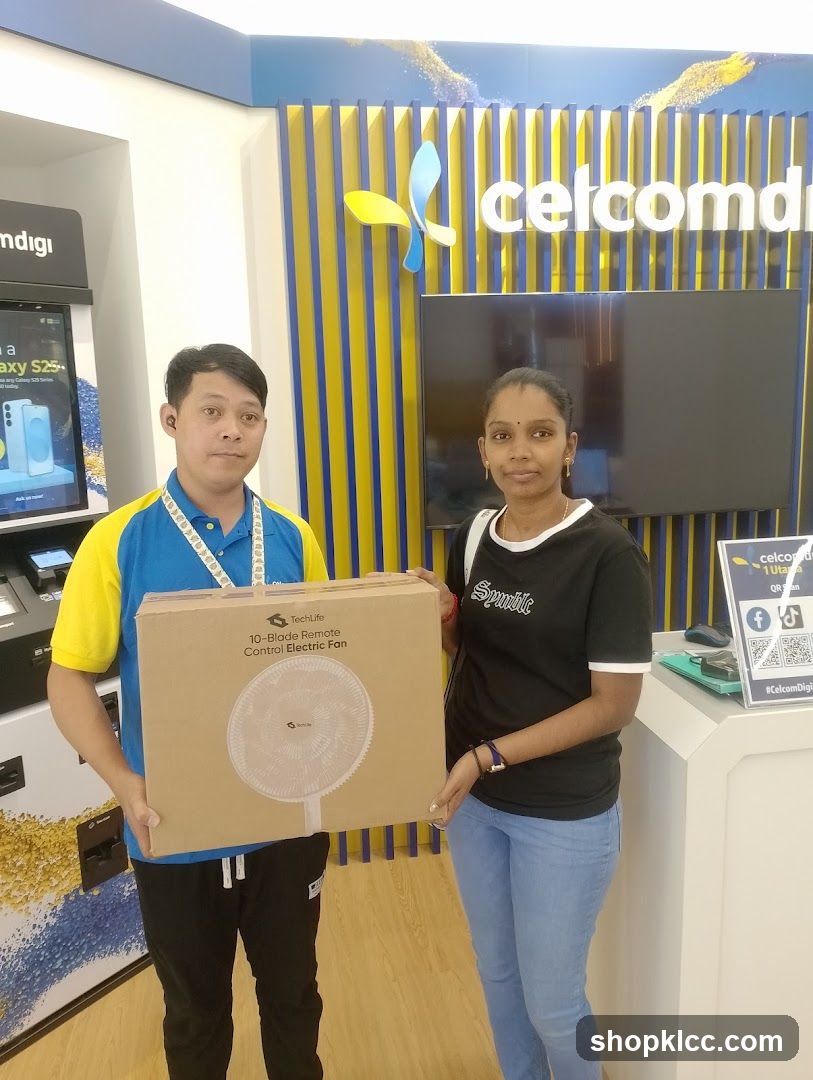 Customer receiving a fan
