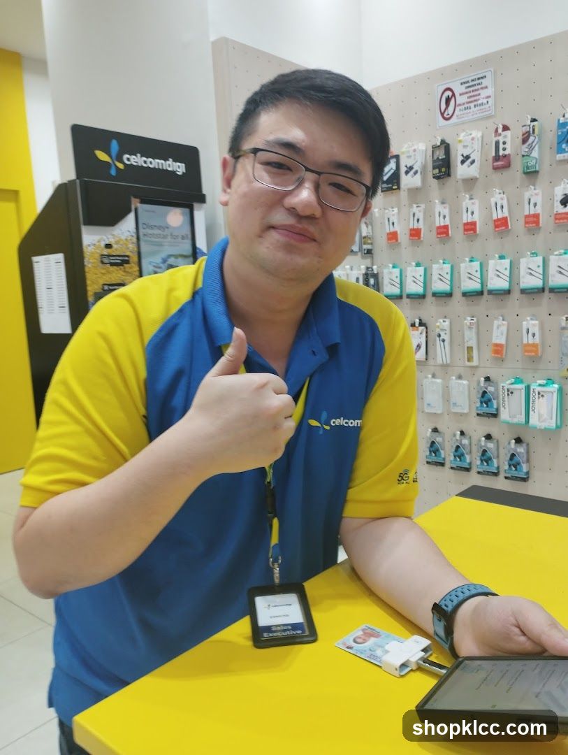 Sales Executive Giving Thumbs Up