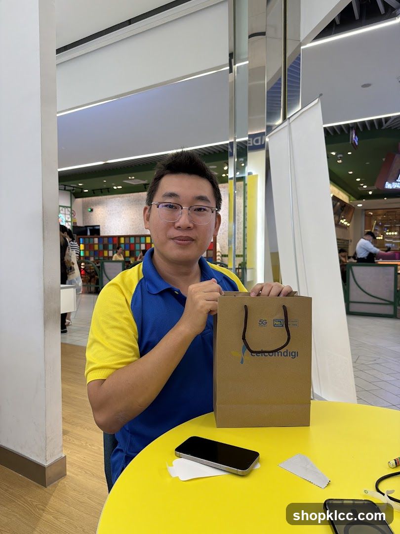 Man with shopping bag and phone