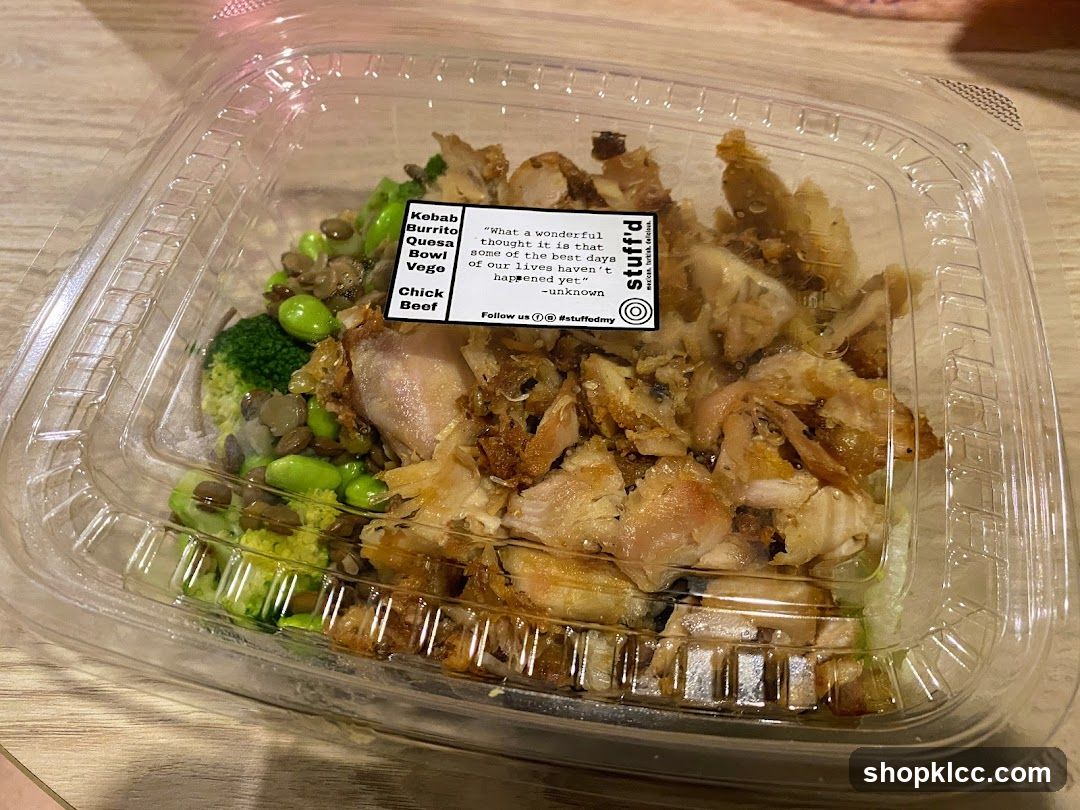 Food container with chicken and vegetables