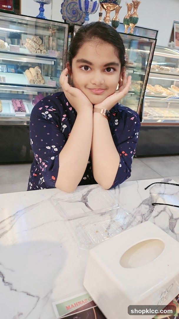 Young girl at a dessert shop