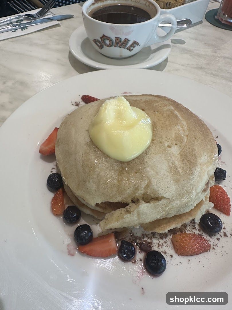 Pancakes with Berries and Coffee