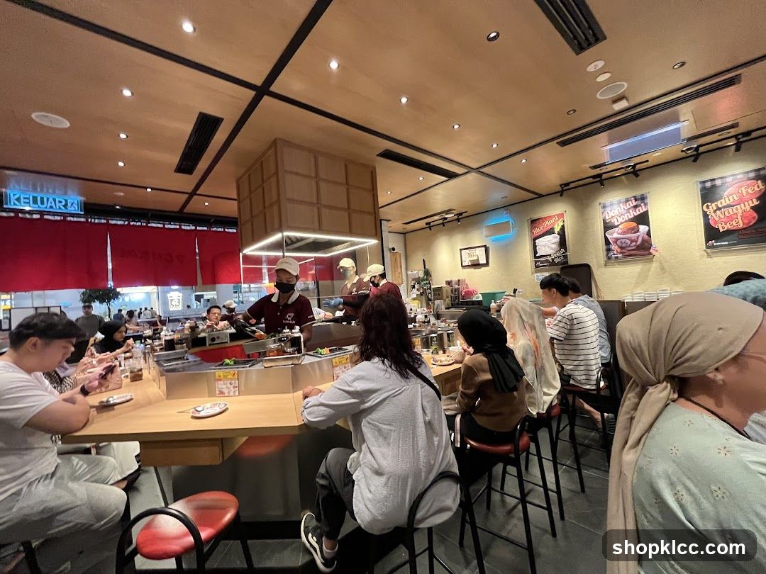 Diners at a Sushi Bar