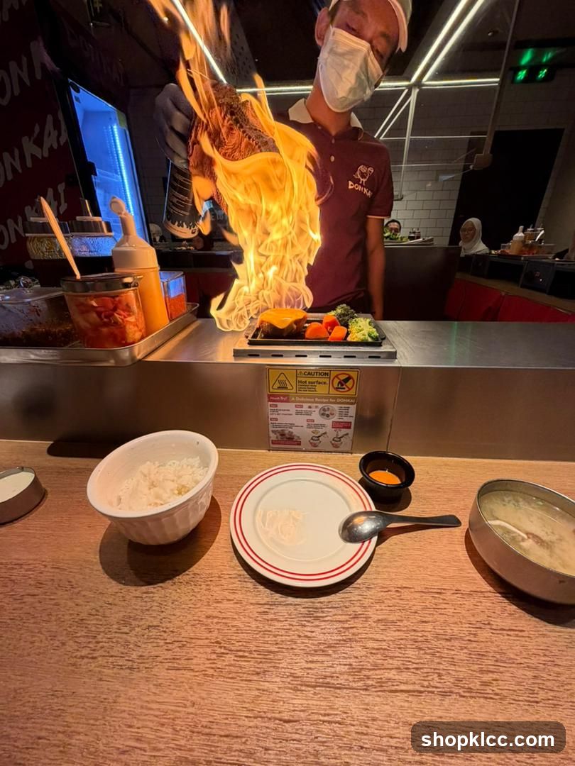 Chef flambéing food
