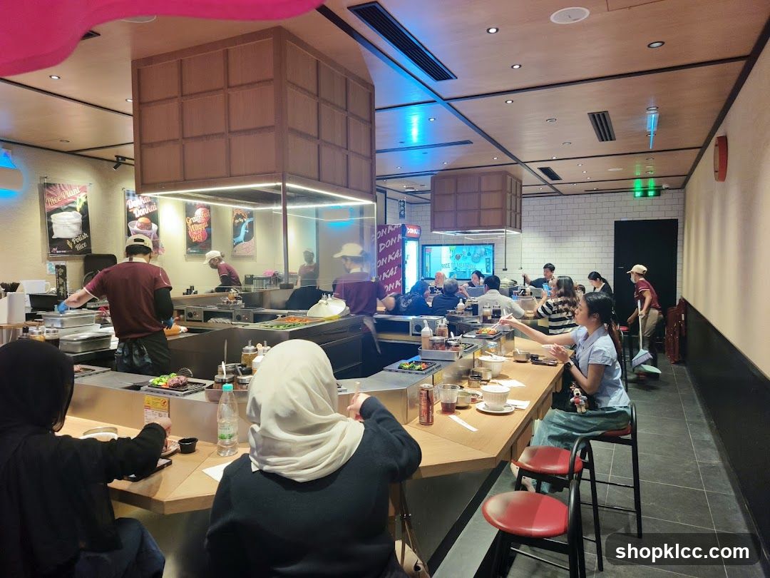Restaurant Interior with Diners and Chefs