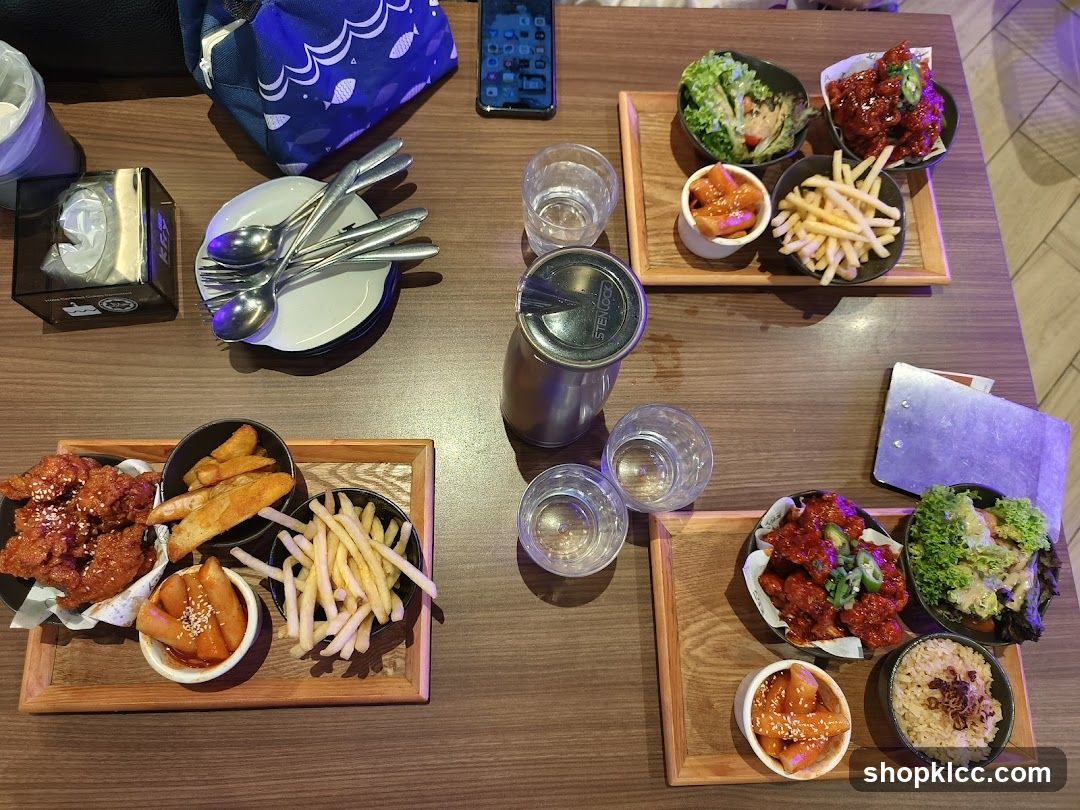Table with Korean Fried Chicken and Sides
