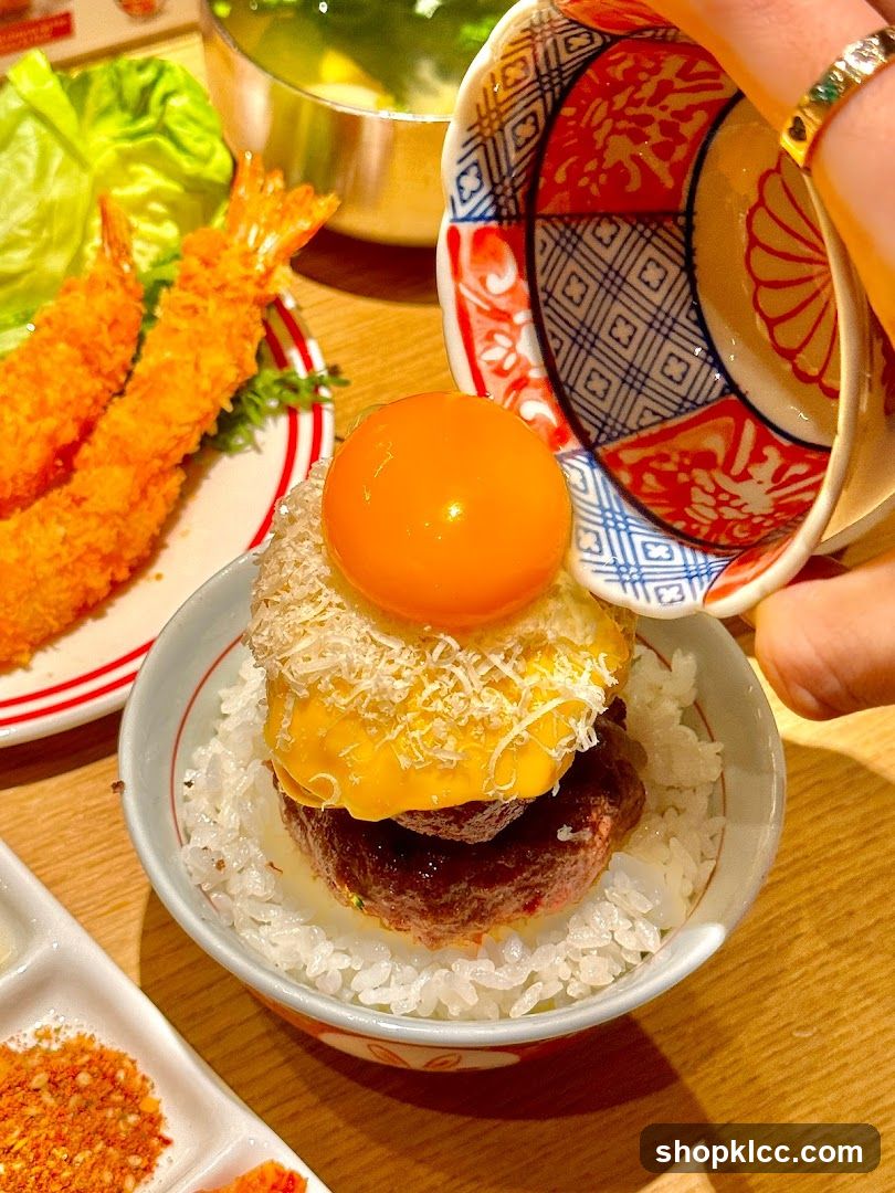 Rice bowl with burger and egg