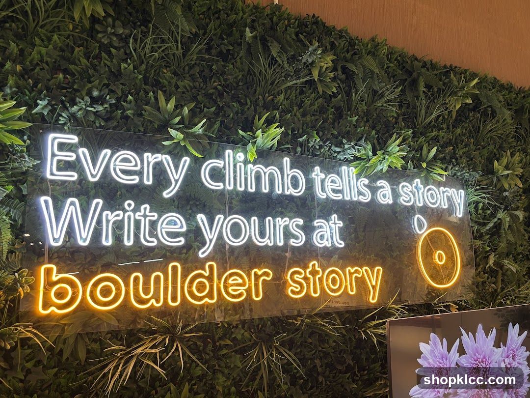 Neon Sign on Green Wall