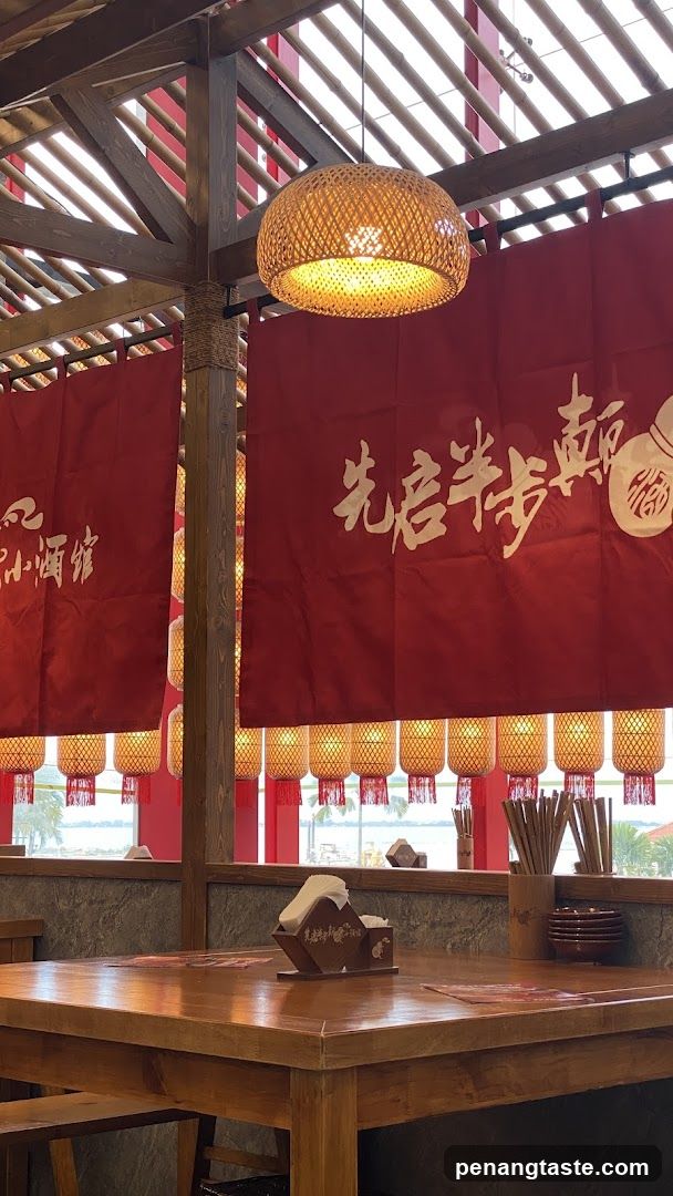 Restaurant Interior with Red Banners and Lanterns