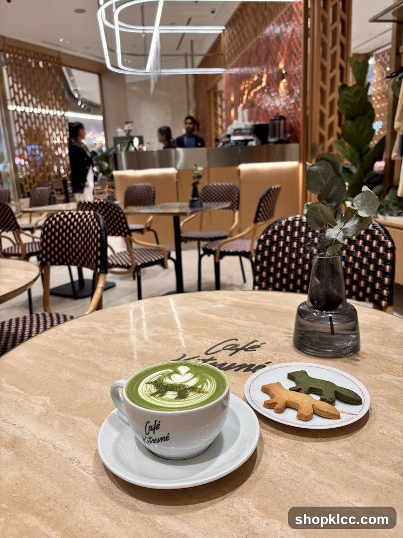 Matcha latte and fox-shaped cookies at a cafe