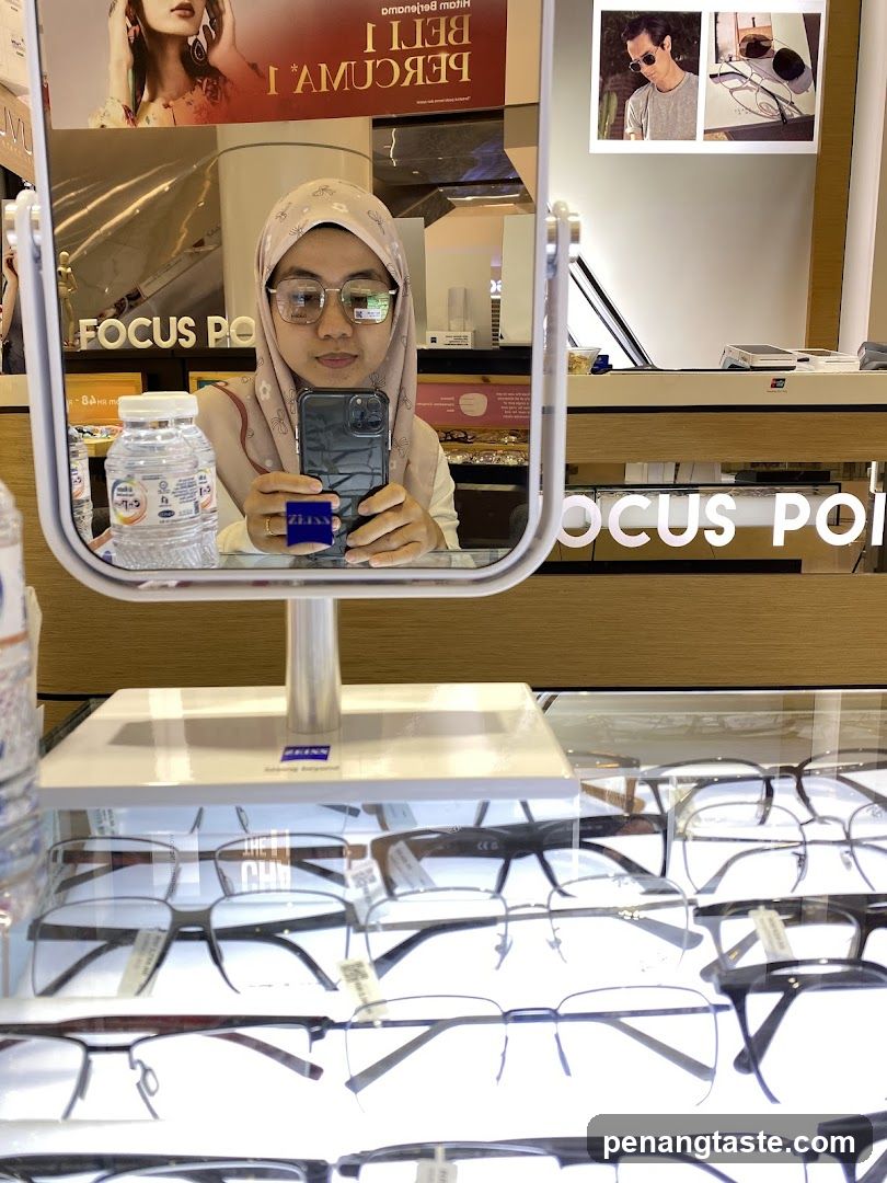 Woman trying on glasses
