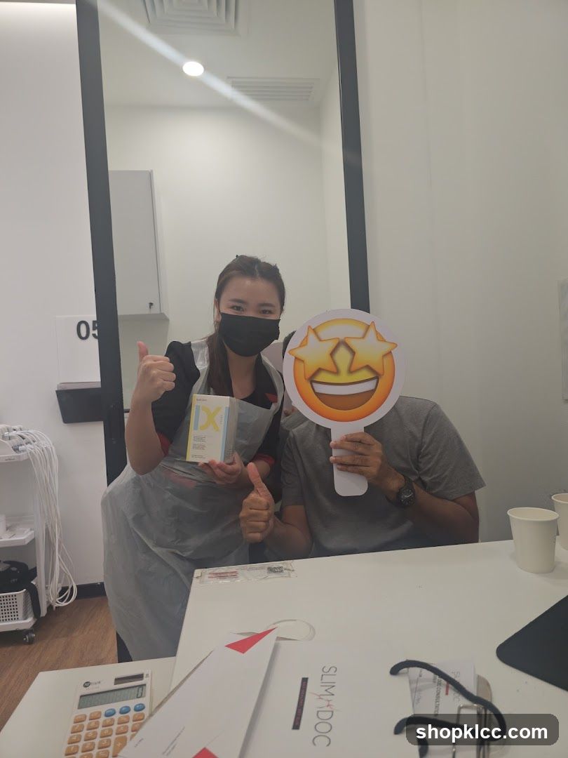 Customer and staff member with product