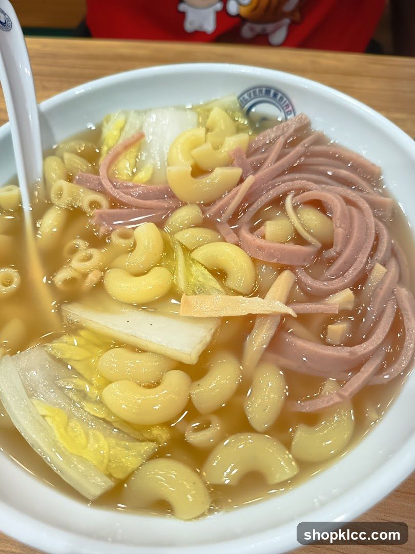 Bowl of noodles with pasta and ham