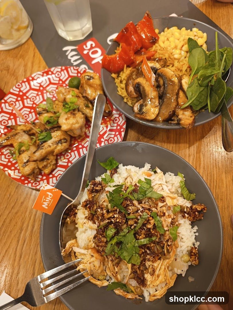 Three bowls of food on a table