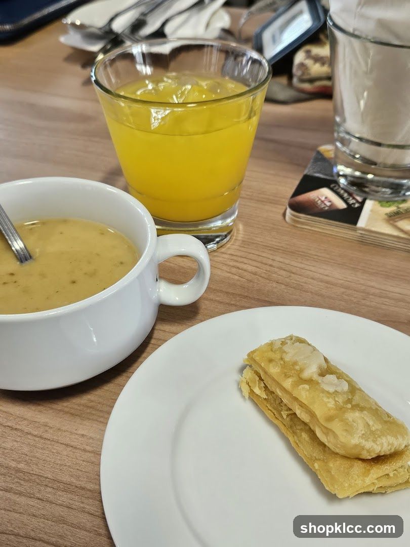Soup, Pastry, and Orange Juice