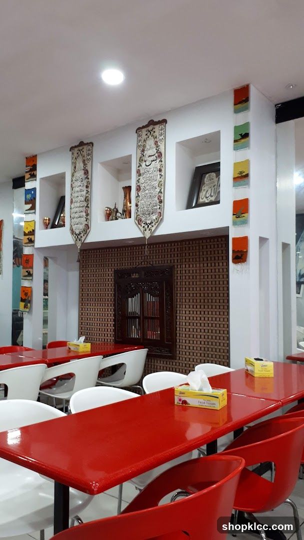 Restaurant Interior with Red Tables and White Chairs