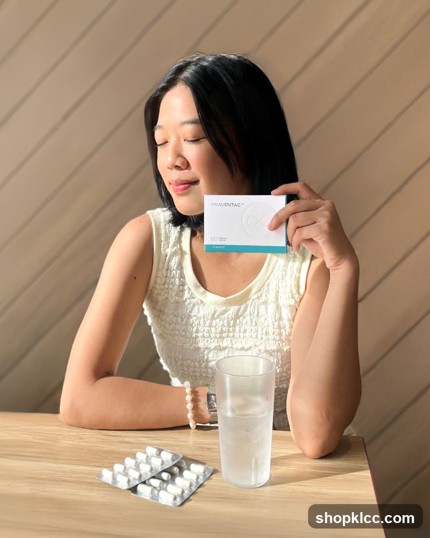 Woman holding a box of Praventac