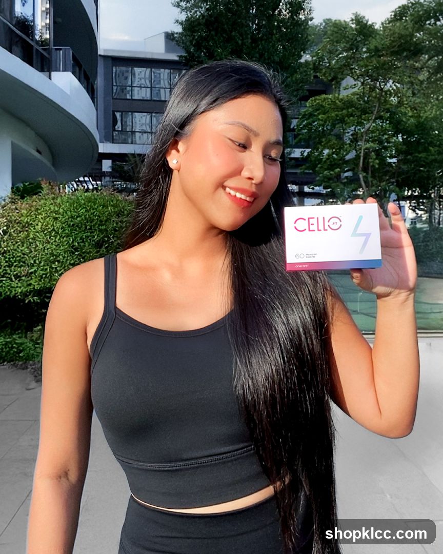 Woman holding a box of Cello Fit supplements