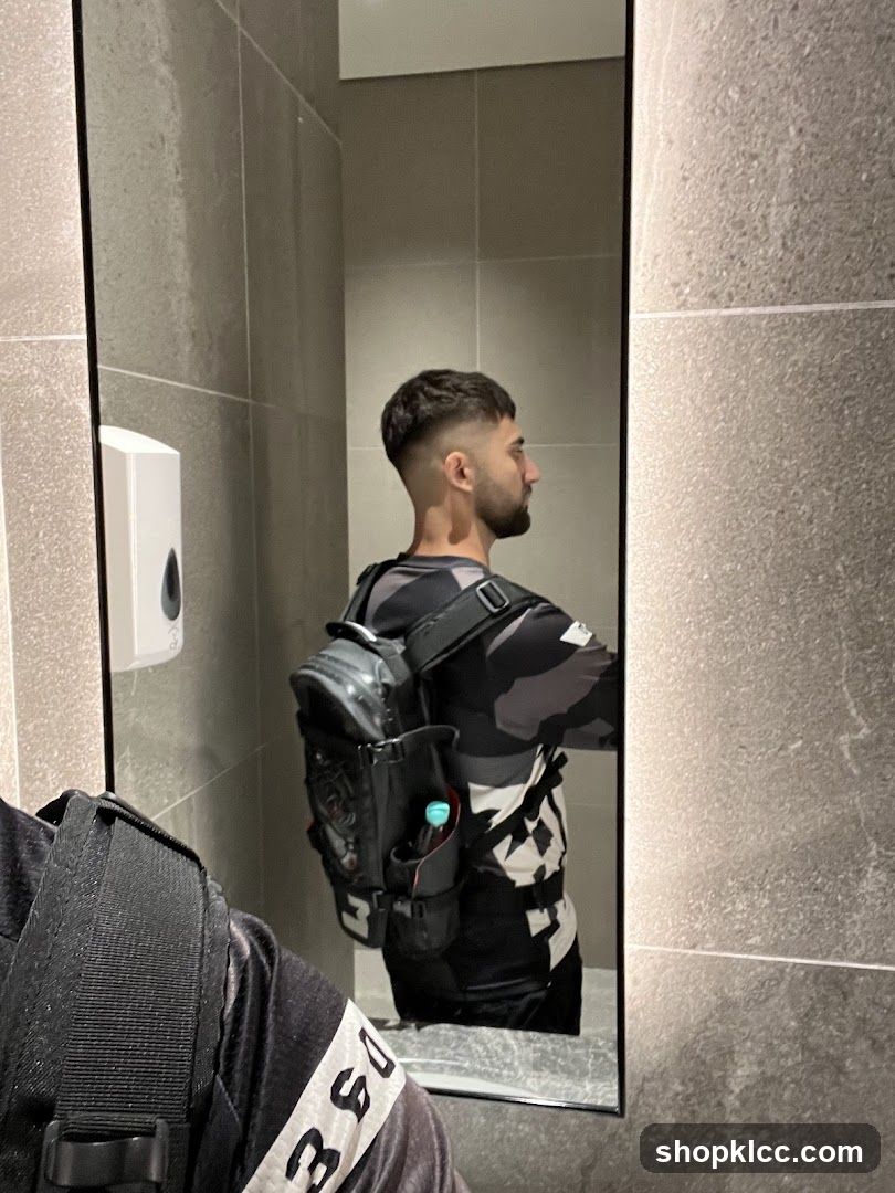 Man in Camouflage Shirt and Backpack